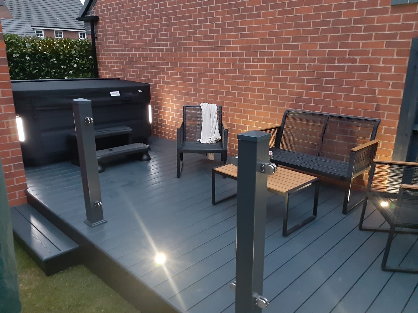 A Close Up Image Of Decking With Post Caps