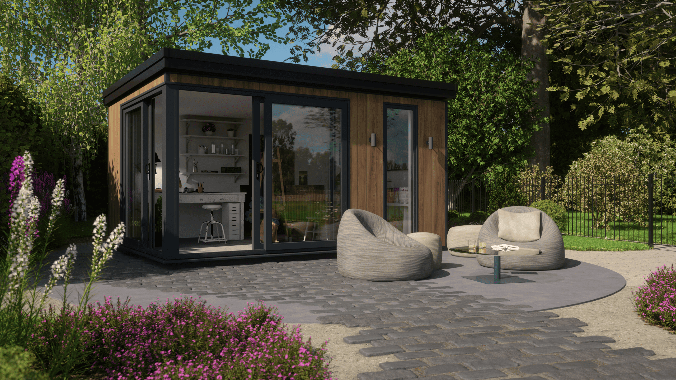 Modern garden room studio with timber cladding and bi-fold doors set in landscaped garden